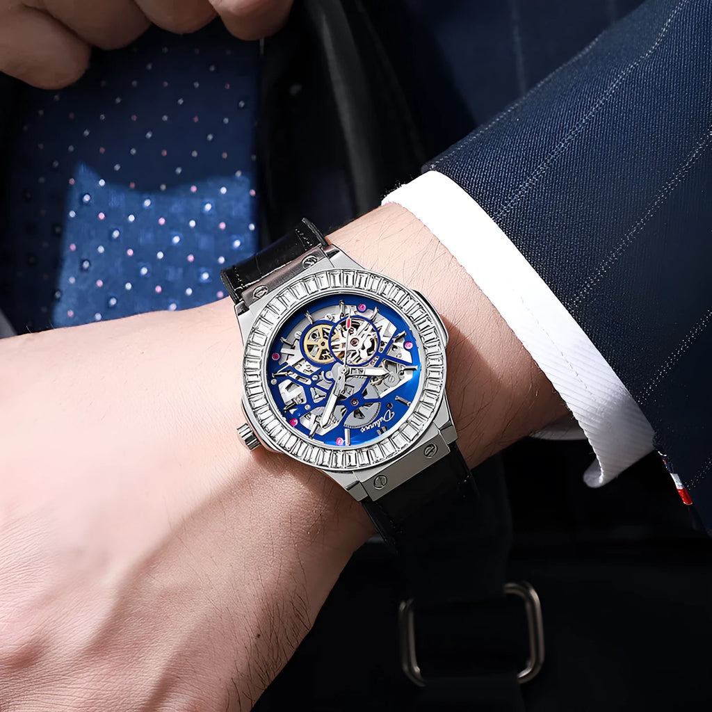 Men's automatic mechanical watch with diamond studs on a hollow dial, shown in a 16mm case.