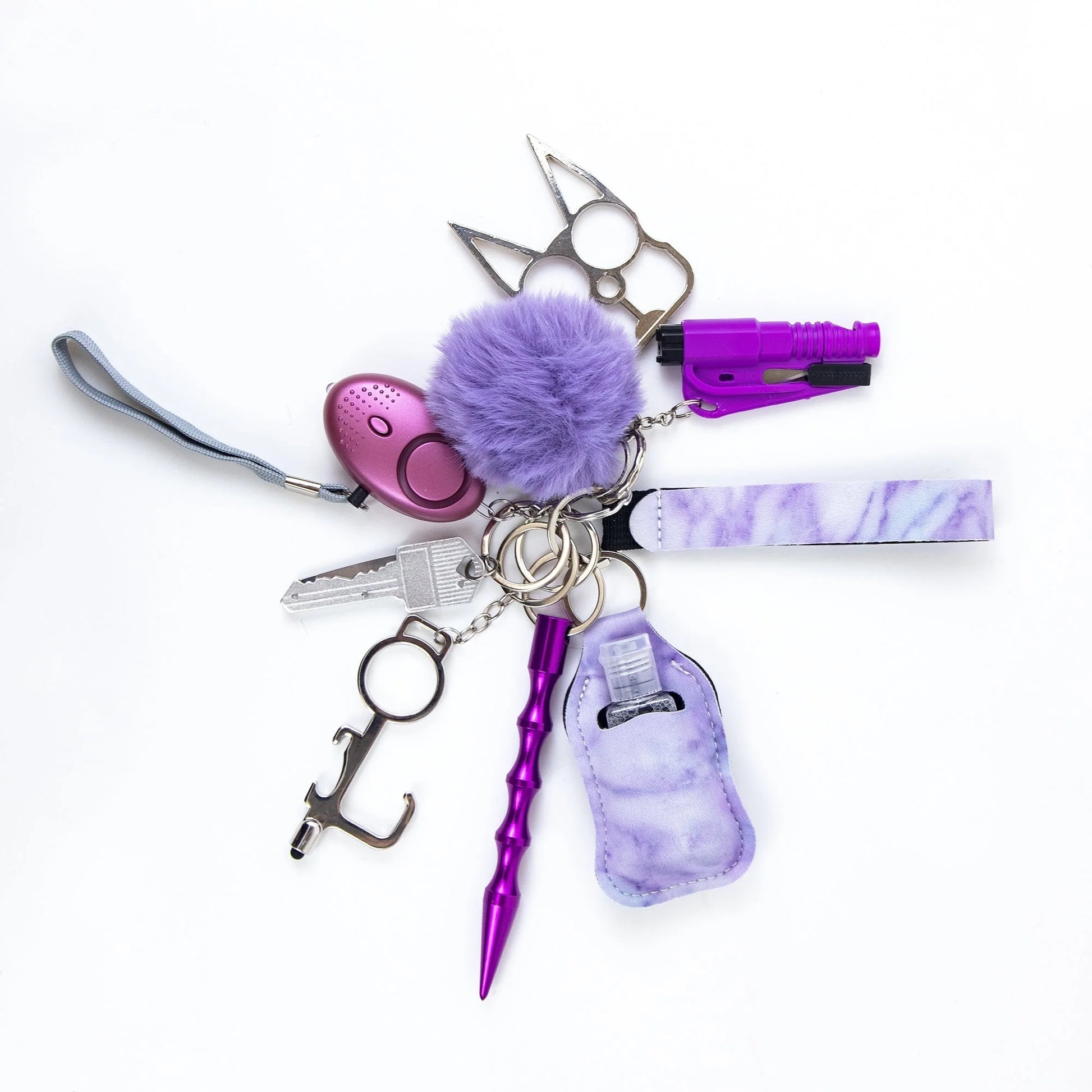Self-defense keychain set for women with 11 safety tools including alarm, window breaker, and whistle