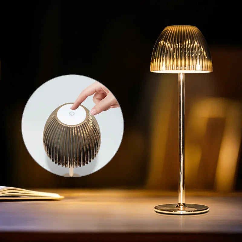 Small modern table lamp with dimming function on thin round base in black finish