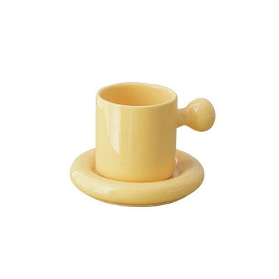 Creative Vitality Egg Yolk Cup Mug and Saucer Set in vibrant coconut milk-white, egg yellow, coral orange, and honeydew green colours
