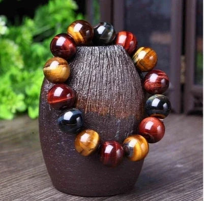 Premium natural tiger's eye crystal bracelet with Buddha beads, a captivating spiritual accessory for any style