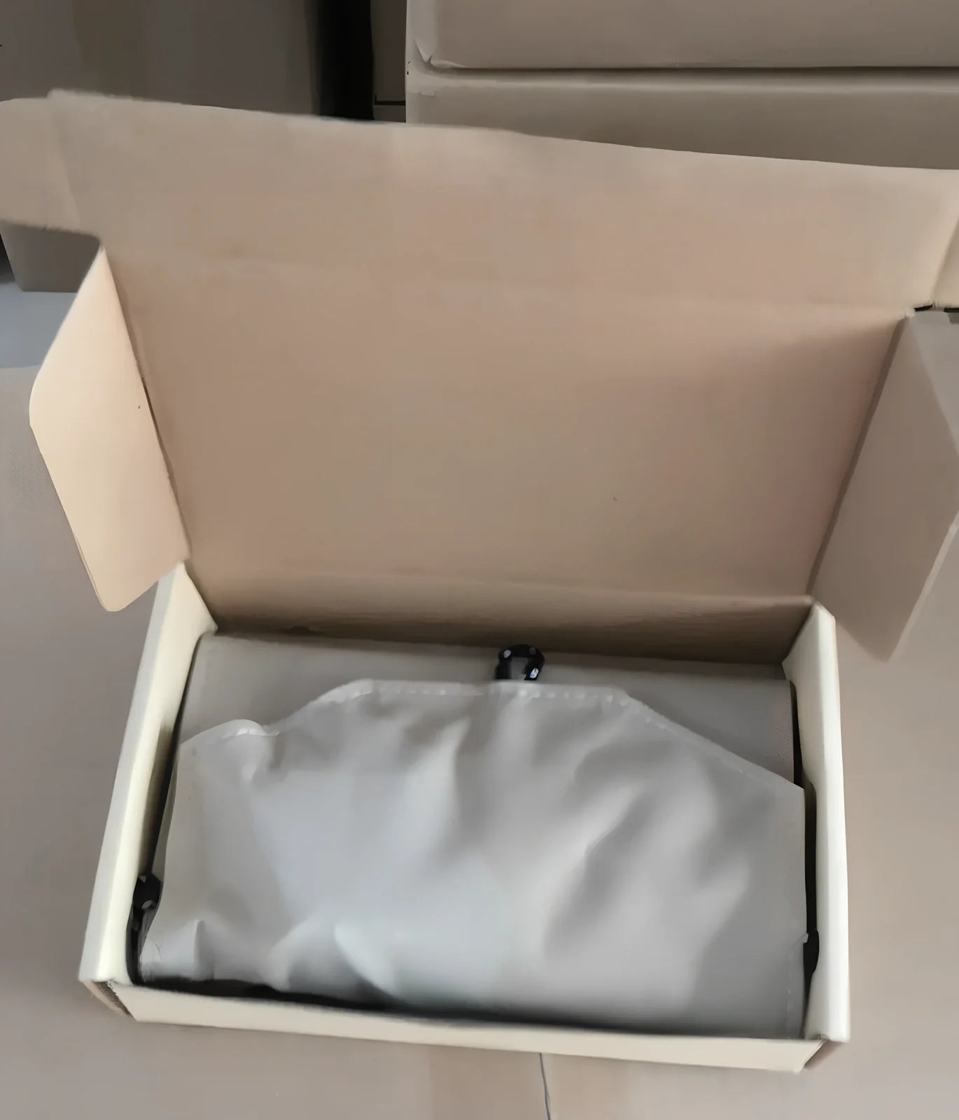 8W folding solar charger with expanded monocrystalline panel showing USB output port