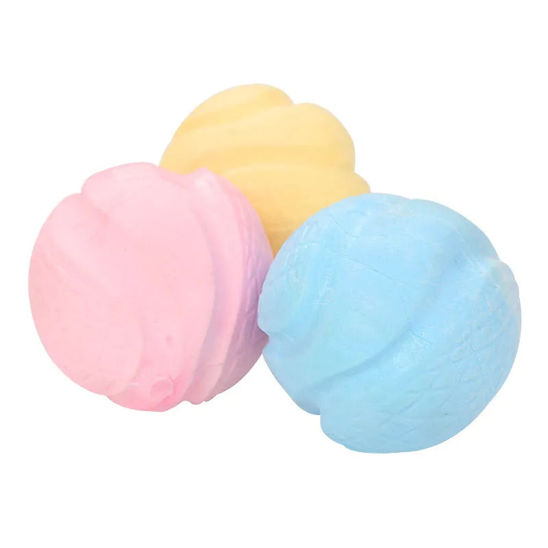 Blue TPR foam solid ball dog toy on a plain background