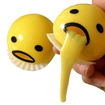 Gudetama Vomiting Egg Toy in green, orange, pink, and yellow