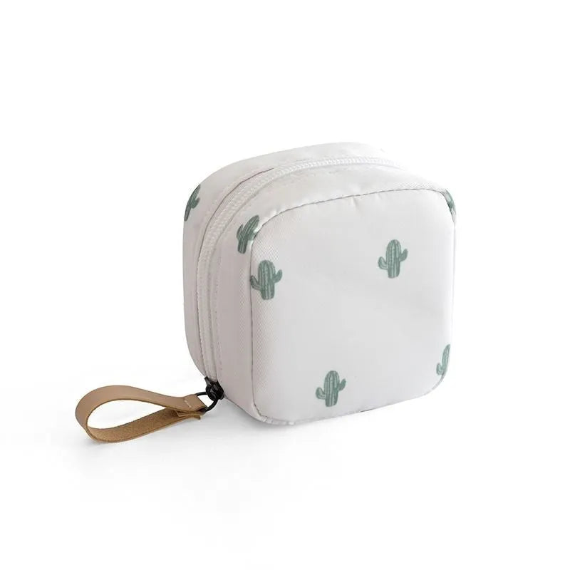 Cube-shaped plain cloth makeup storage bag in blue, pink, white, or white pink.
