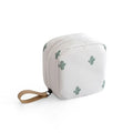 Cube-shaped plain cloth makeup storage bag in blue, pink, white, or white pink.