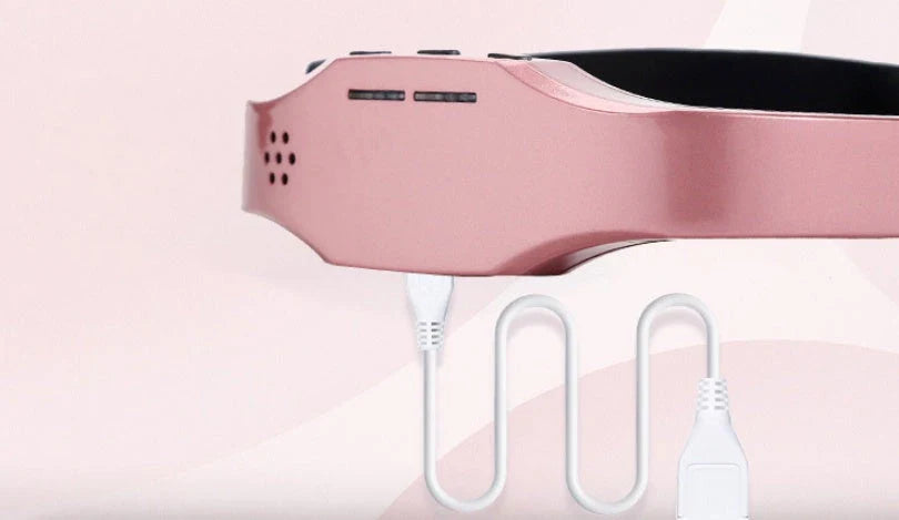 Wireless Head Massager Helmet in black and pink for stress relief and sleep therapy