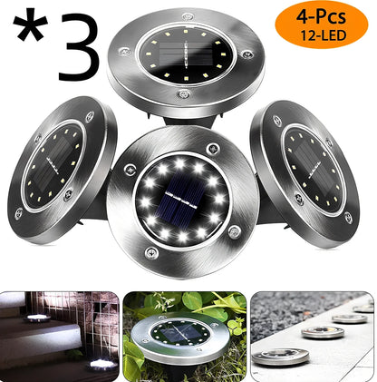 8LED waterproof solar garden light staked in lawn with warm glow, IP65 rated for rain resistance