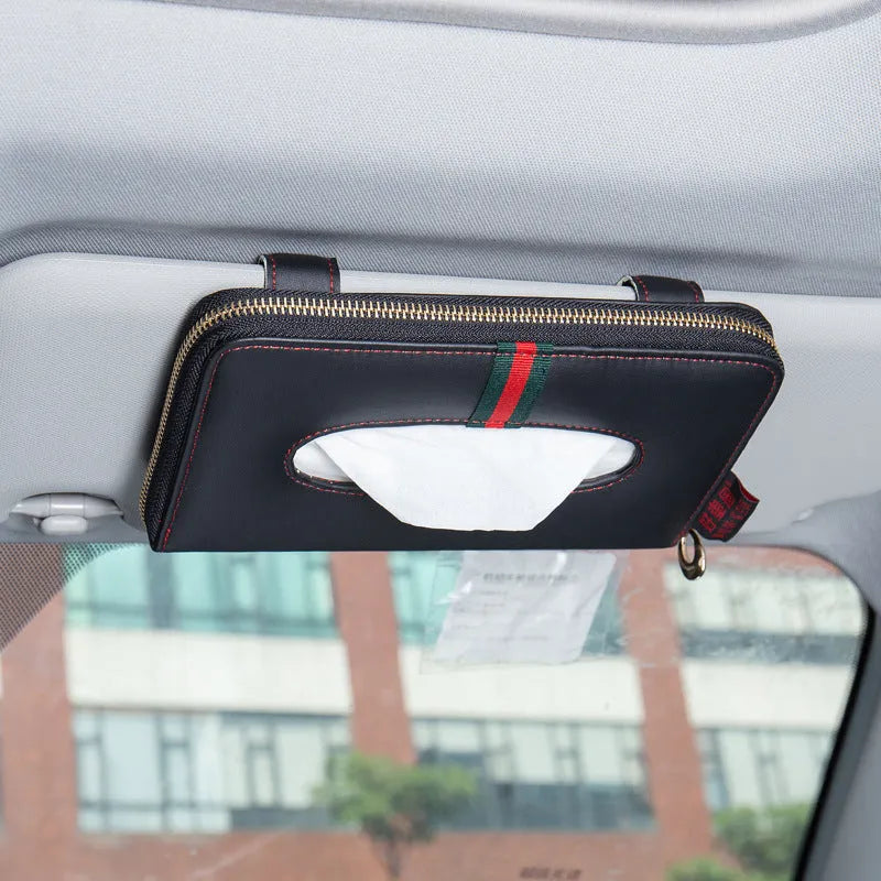 Car tissue box cover in black microfiber leather attached to a car sun visor, dimensions 21x13x2cm