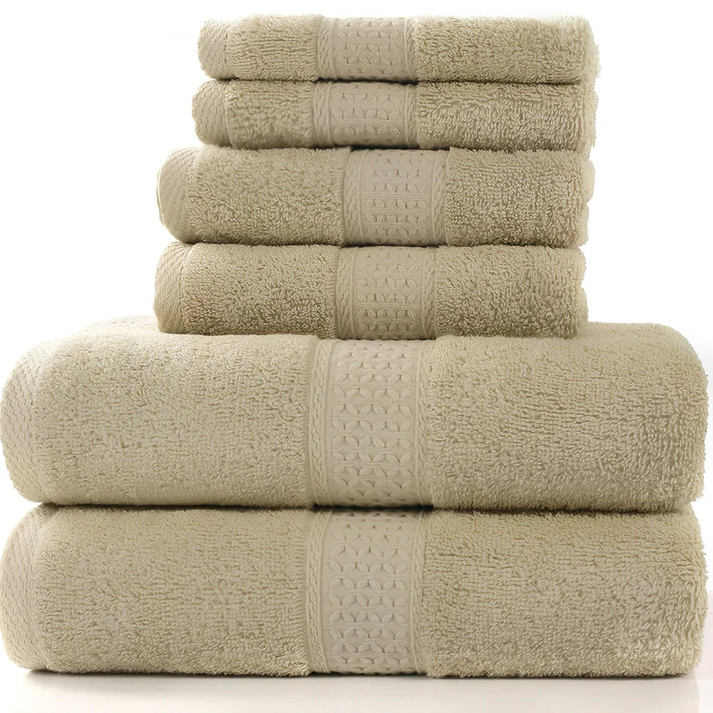 Pure cotton absorbent towel set in bamboo green, showing 140x70cm bath, 33x73cm hand, and 33x33cm square towels