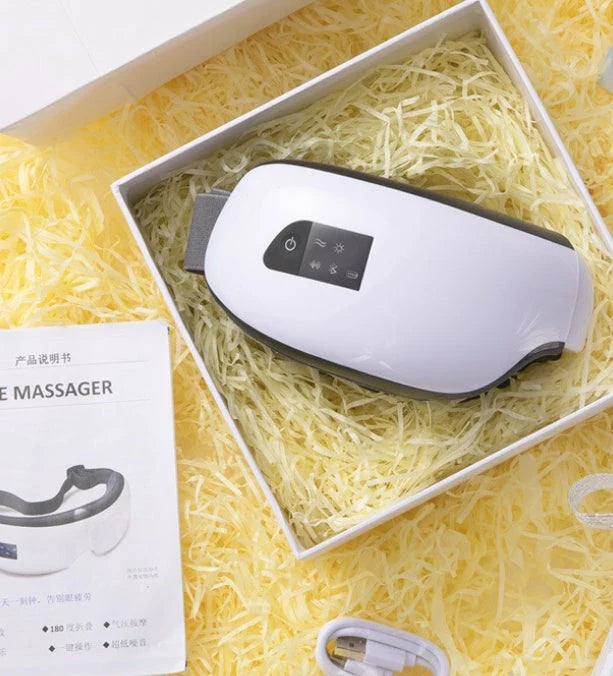 Bluetooth Music Eye Massager with air pressure and hot compress features in a compact leather case