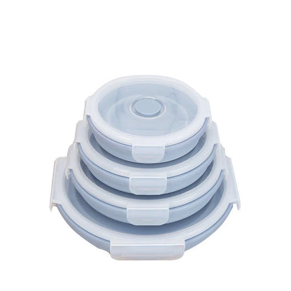 Round silicone lunch box in various colours, microwave-safe and leak-proof