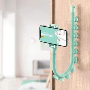 Black flexible arm phone holder with suction cup mounted on a desk, showing 360° rotation.
