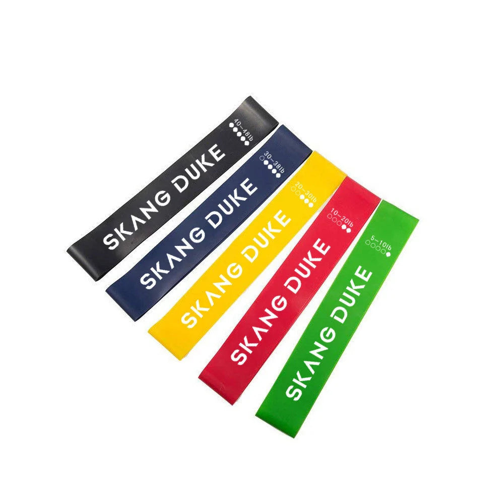 Set of five colour-coded resistance bands for yoga and fitness training, with storage bag