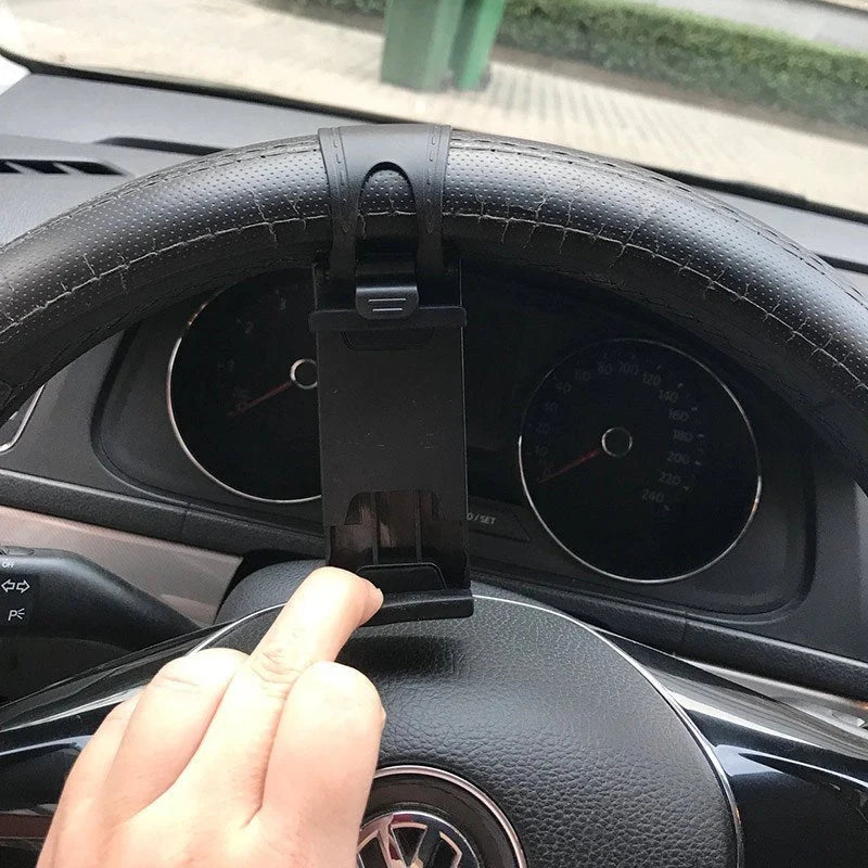 Universal steering wheel phone holder for hands-free navigation and calls