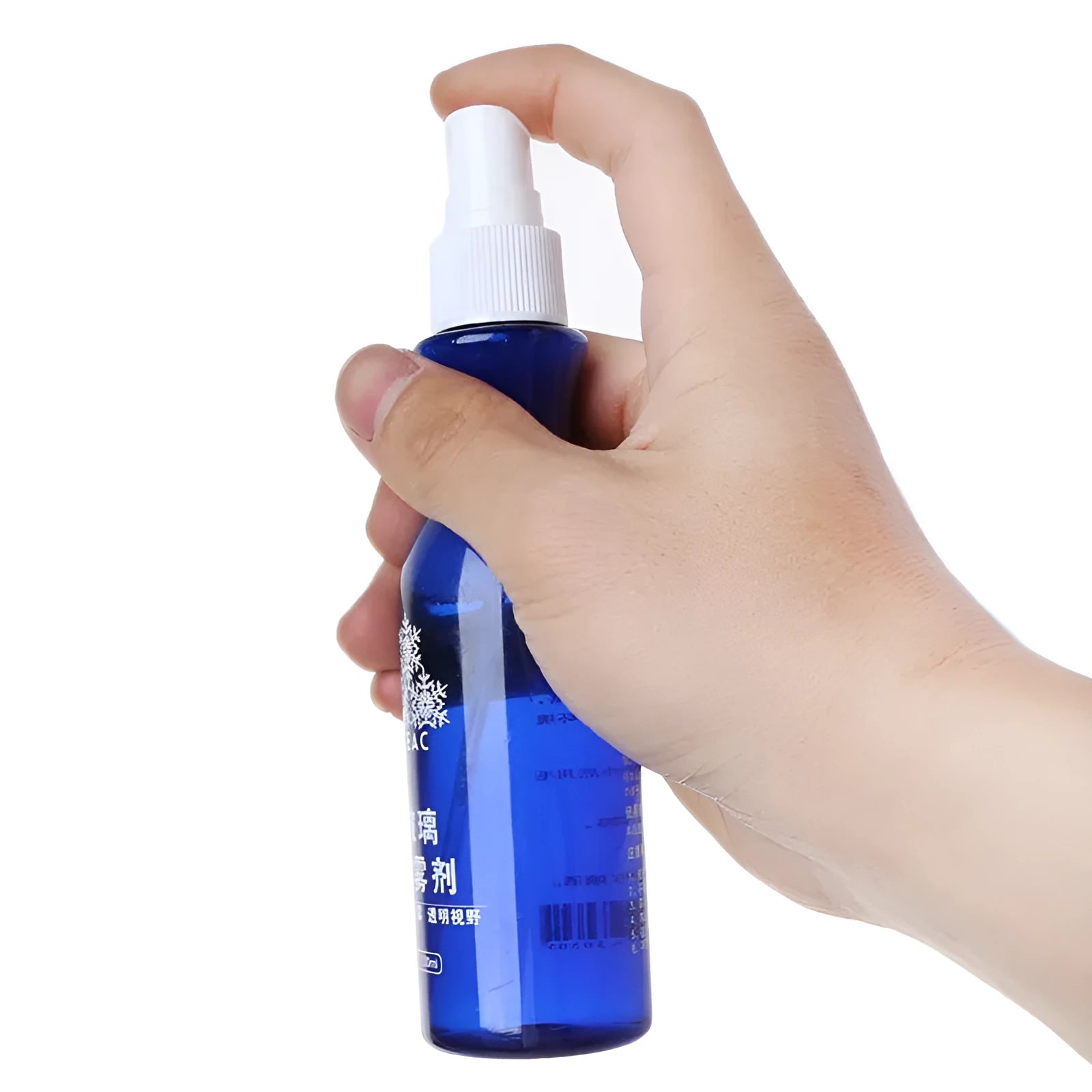 Blue bottle of windscreen liquid-spray anti-fog agent 100 ml on car dashboard