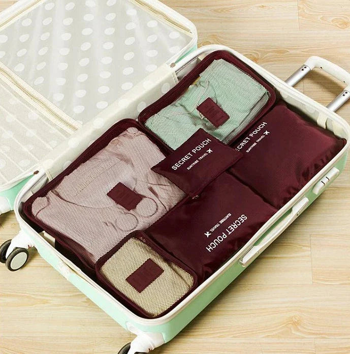 Durable waterproof packing cubes in various colors for organized, efficient travel