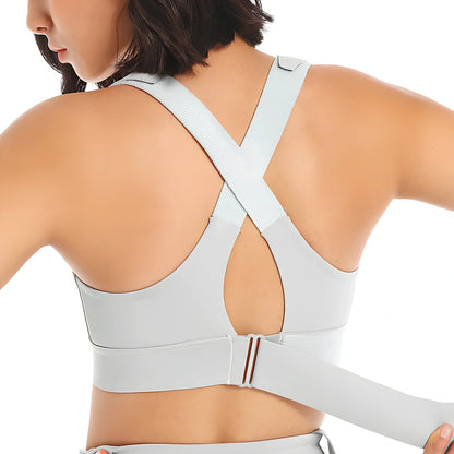 Women's black seamless sports bra with front zipper closure for high-impact workouts