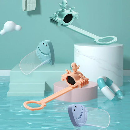 Children's faucet extender in blue, pink, and purple colours