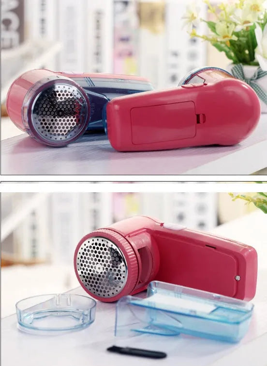 Portable electric clothing lint remover and fabric shaver on a white background.