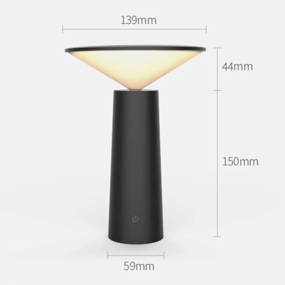 Black USB LED table lamp with touch controls and adjustable lamp head on wooden desk