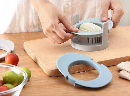 Three-in-one egg cutting gadget in red, blue, and orange colours