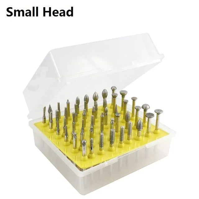 Set of alloy grinding heads with elliptical cone diamond and golden diamond tips on a white background.