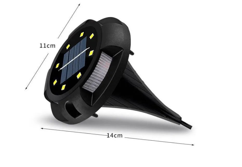 LED solar underground lawn light 11x4x13cm black ABS PP with seven colour changing cold white light on grass at dusk
