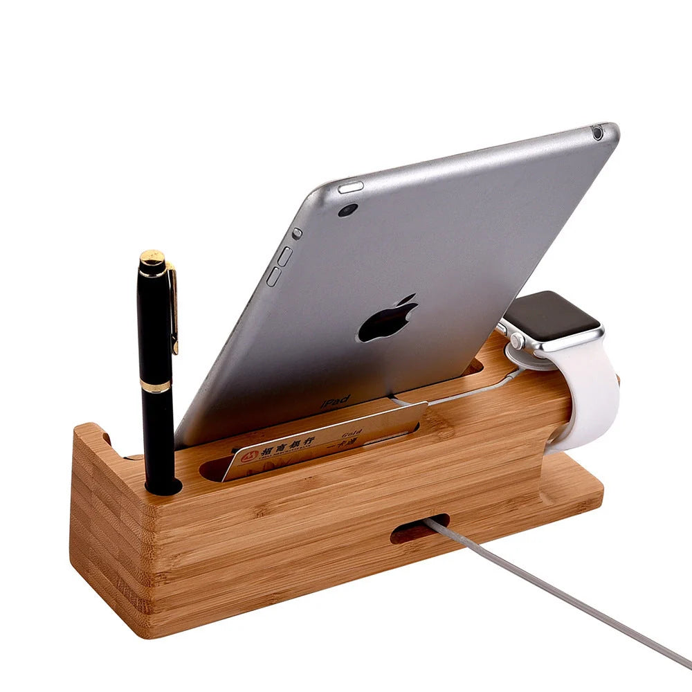 Carbonized bamboo dual phone and watch holder on a desk