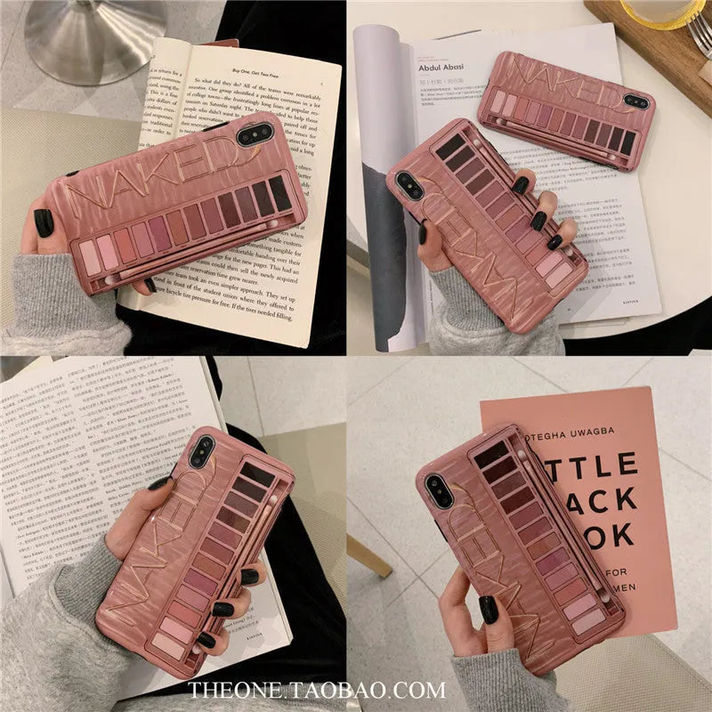 Flesh and grey silicone phone case for various iPhone models on a table.