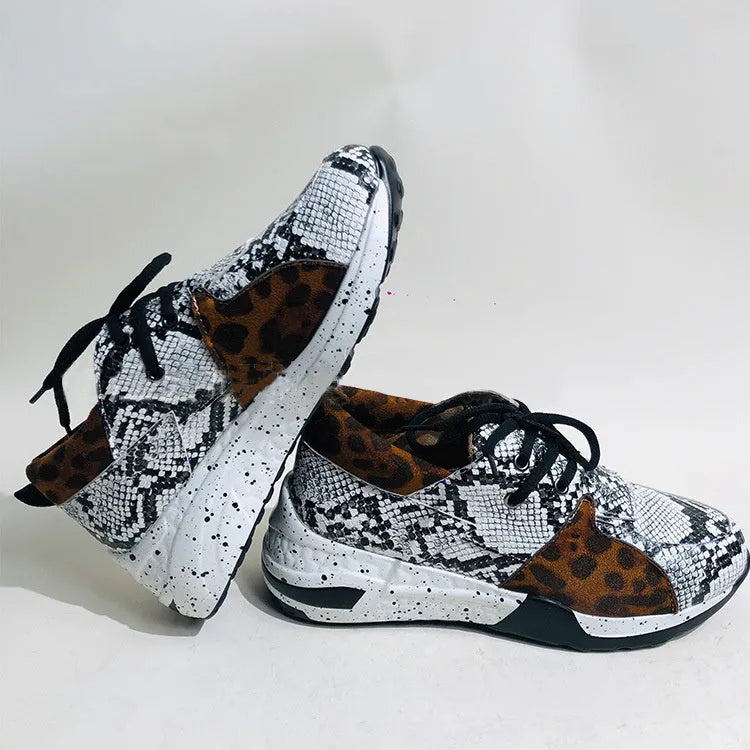 Women's suede sneakers with a wedge heel in various colours on a white background.