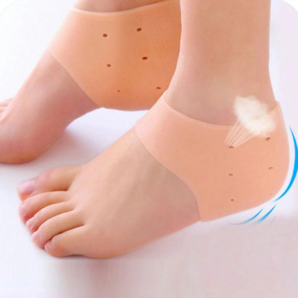 Perforated silicone heel protector in white, showing medical-grade material and breathable design