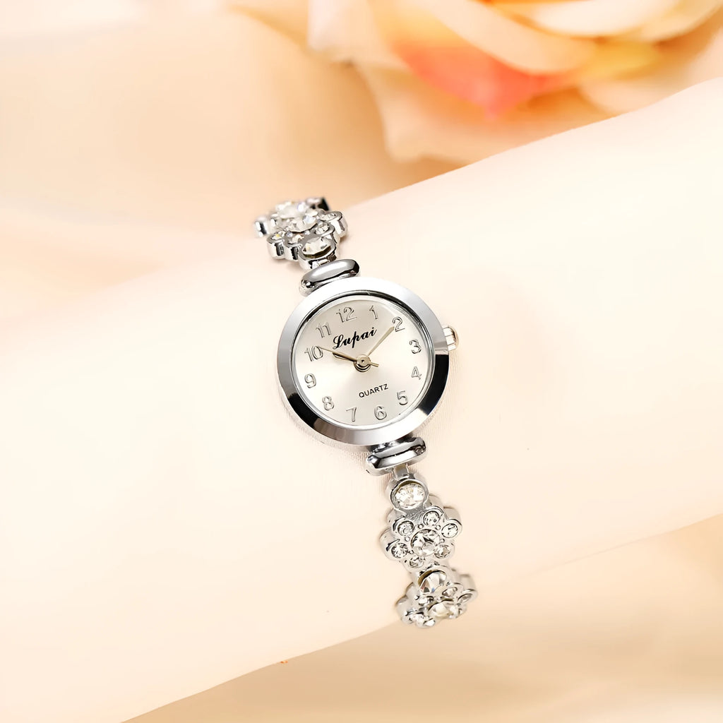 Ladies flower bracelet watch with round dial and silicone strap in gold colour