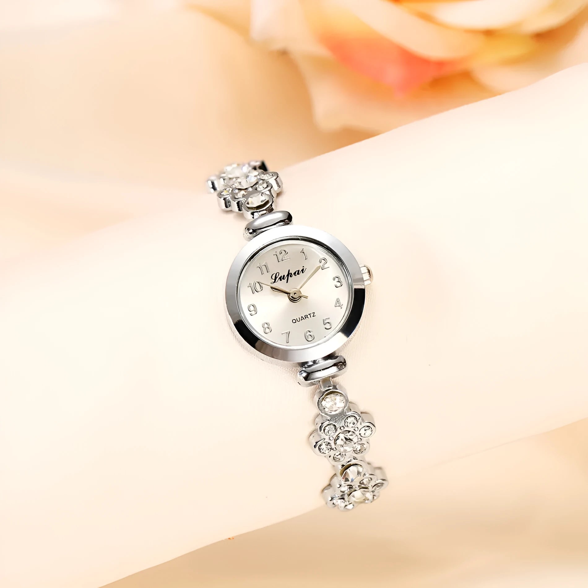Ladies flower bracelet watch with round dial and silicone strap in gold colour