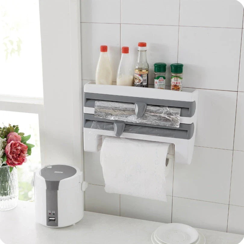 Versatile wall-mounted kitchen storage dispenser with cling film, foil, and paper towel cutting tools