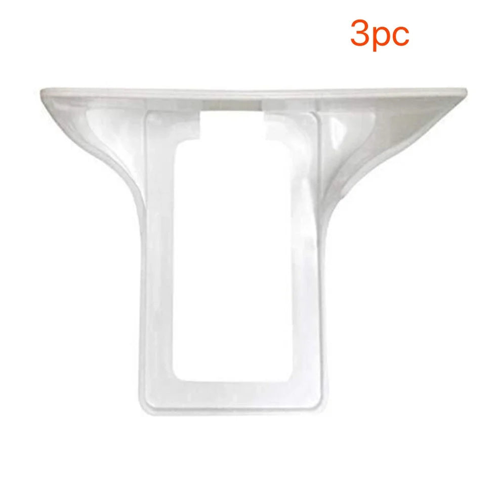 White wall outlet organizer with rubber pad for easy cable management