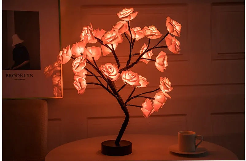 White and red rose flower LED table lamp with warm white lights on wooden surface