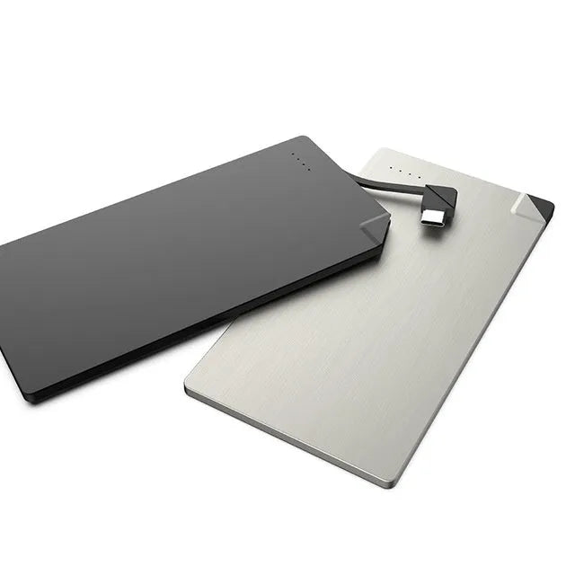 Silver ultra-thin graphene power bank measuring 140mm by 72mm by 4mm