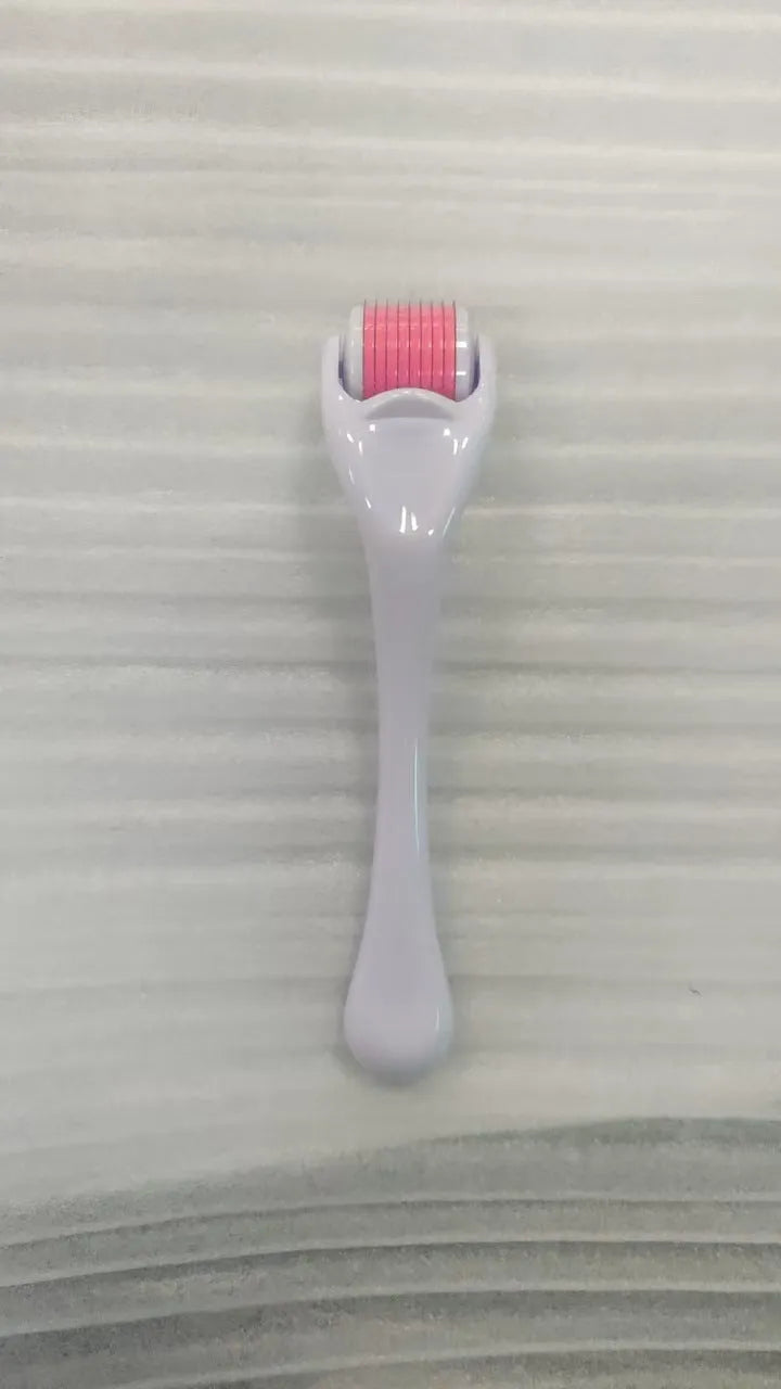 540 needle microneedle derma roller with colour wheel on black handle, showing 0.25mm specification.