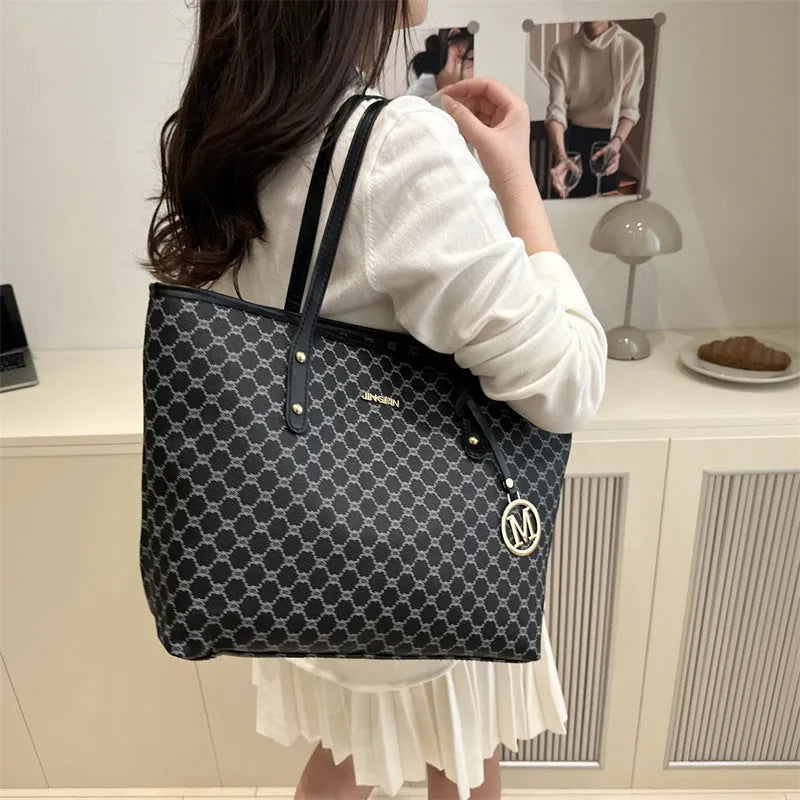 Western style black PU leather shoulder bag with sewing thread details and polyester lining.