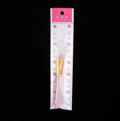 Silicone facial mask brush with 0.5cm bristles and 15cm handle in navy blue colour