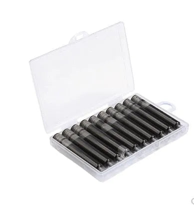 Set of 10 steel ink sac converters for fountain pens next to bottled ink