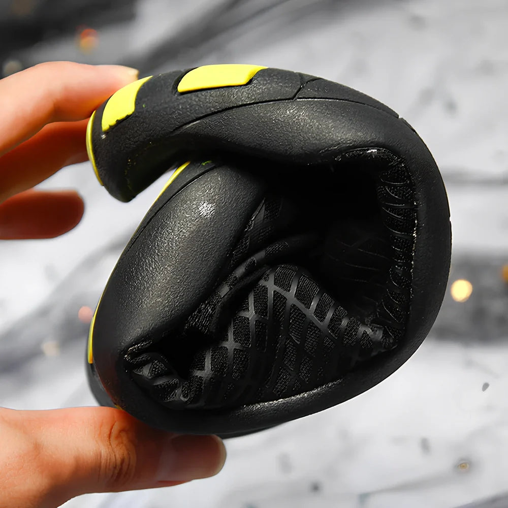 Children's black and yellow snorkeling socks with rubber soles and mesh uppers for river and water protection, UK sizes 5-12