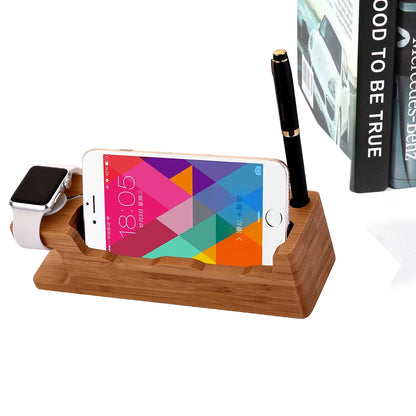 Carbonized bamboo dual phone and watch holder on a desk