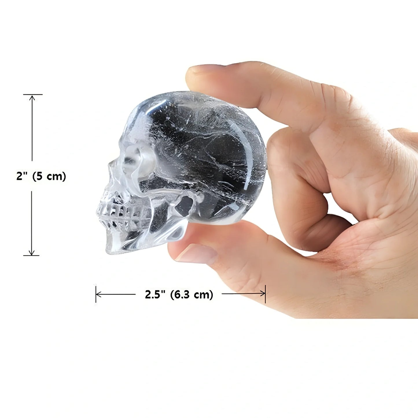 Black silicone ice cube tray with four skull-shaped cavities measuring 12cm long