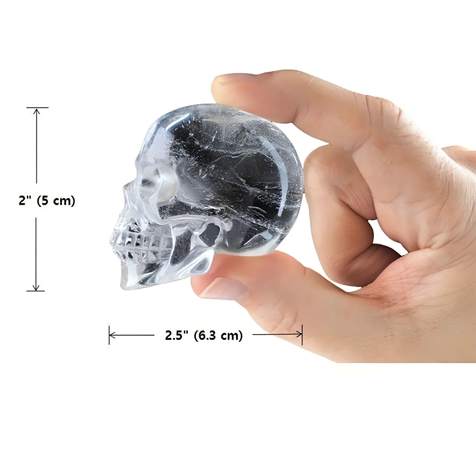 Black silicone ice cube tray with four skull-shaped cavities measuring 12cm long