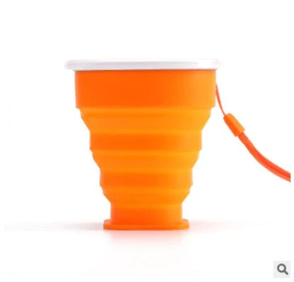 Collapsible stainless steel travel water cup showing expanded and compressed states