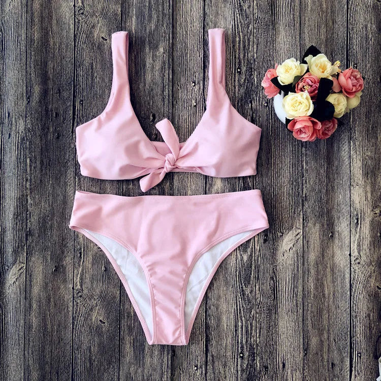 Women's polyester bikini set in black, pink, red, white or wine red with matching bra and panties
