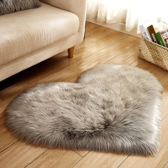 Soft, plush heart-shaped rug in various colors and sizes for comfortable home decor