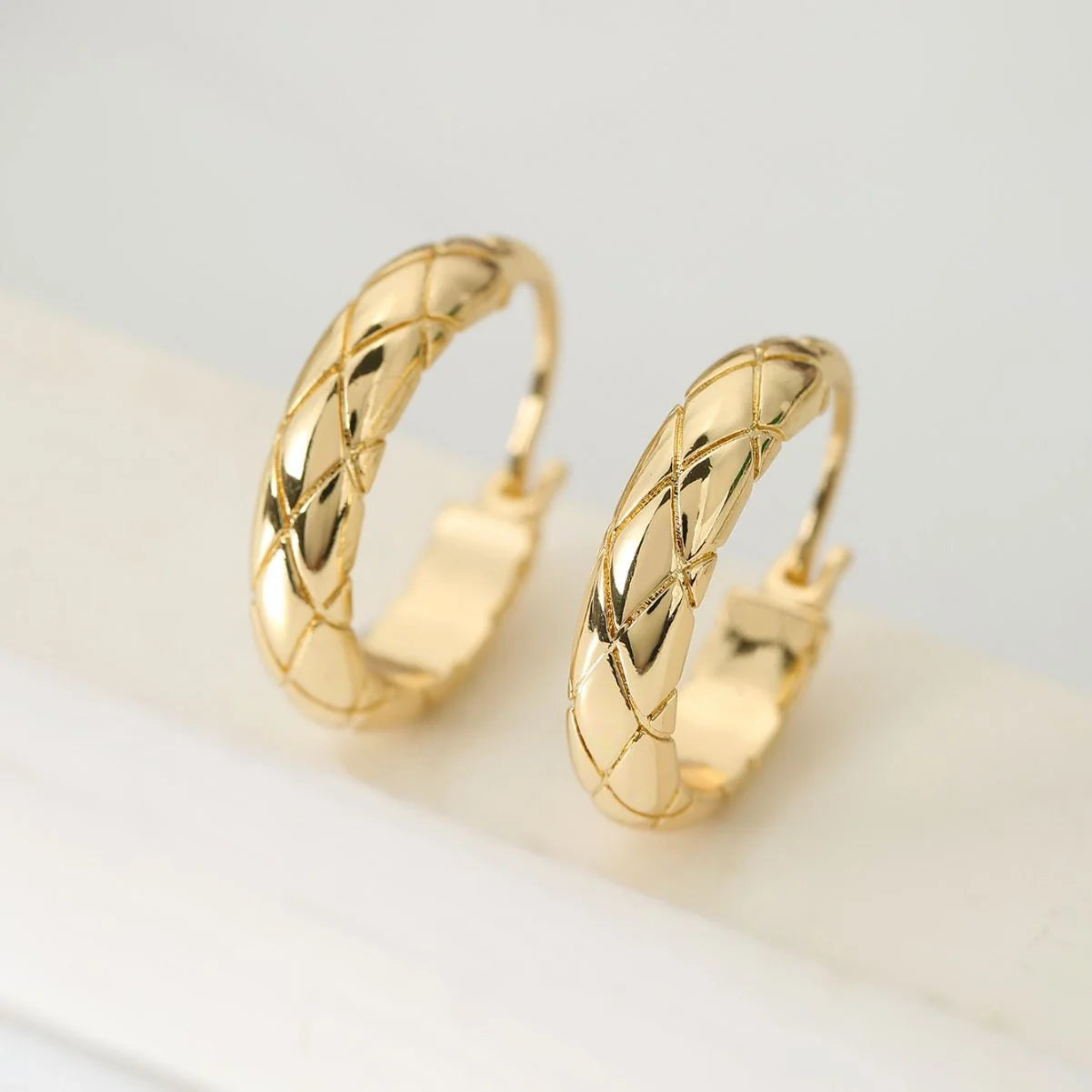 Diamond plaid earrings in golden yellow and silver, featuring a glossy finish and European and American style.